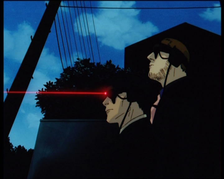 Silhouette of a Man in Black holding an unknown device